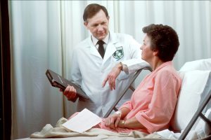 Physician talking to a patient
