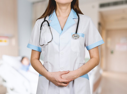 a woman wearing a stethoscope around her neck