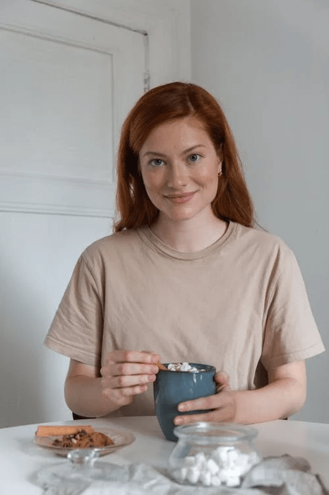 A caregiver smiling while taking a break