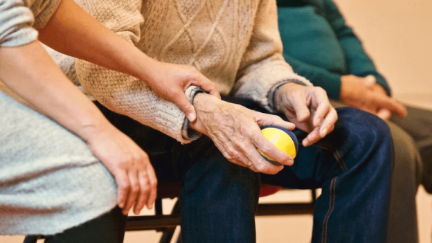 A caregiver comforting a patient in a serene environment