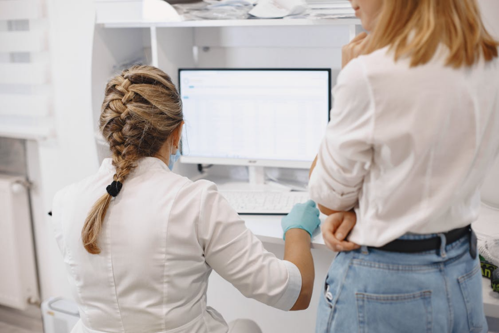 A healthcare practitioner looking at digital medical records 