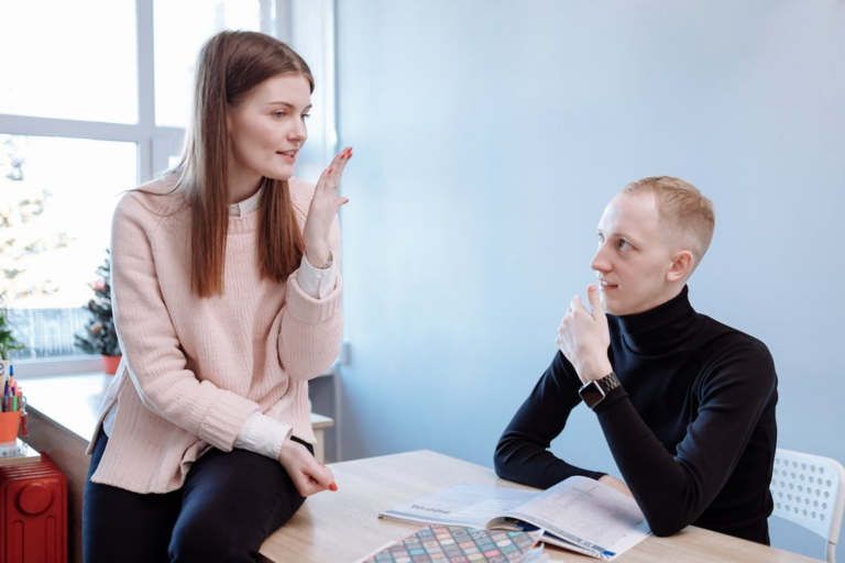 A support worker talking to a teen