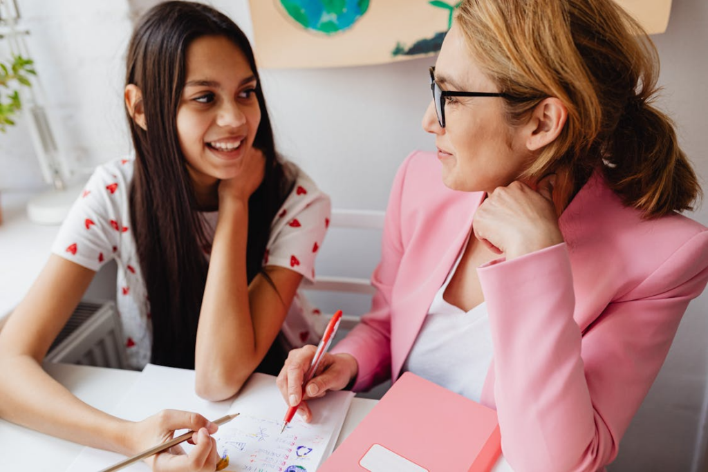 A support worker helping a teen