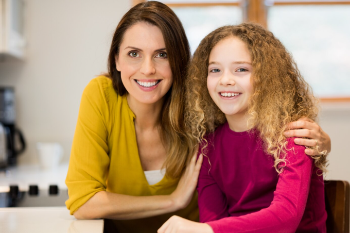 Support worker engaging with child in calm learning environment 
