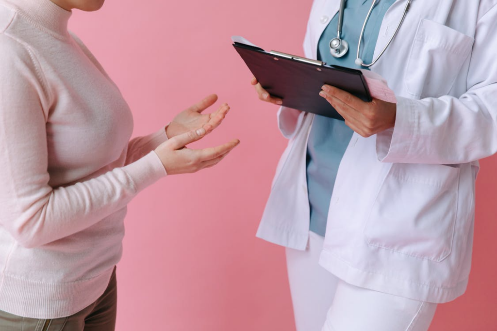 An image of a doctor consulting a patient