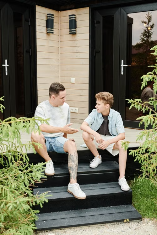 Two teens having a conversation 