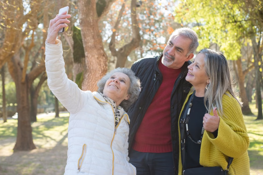 A group of older adults taking a selfie